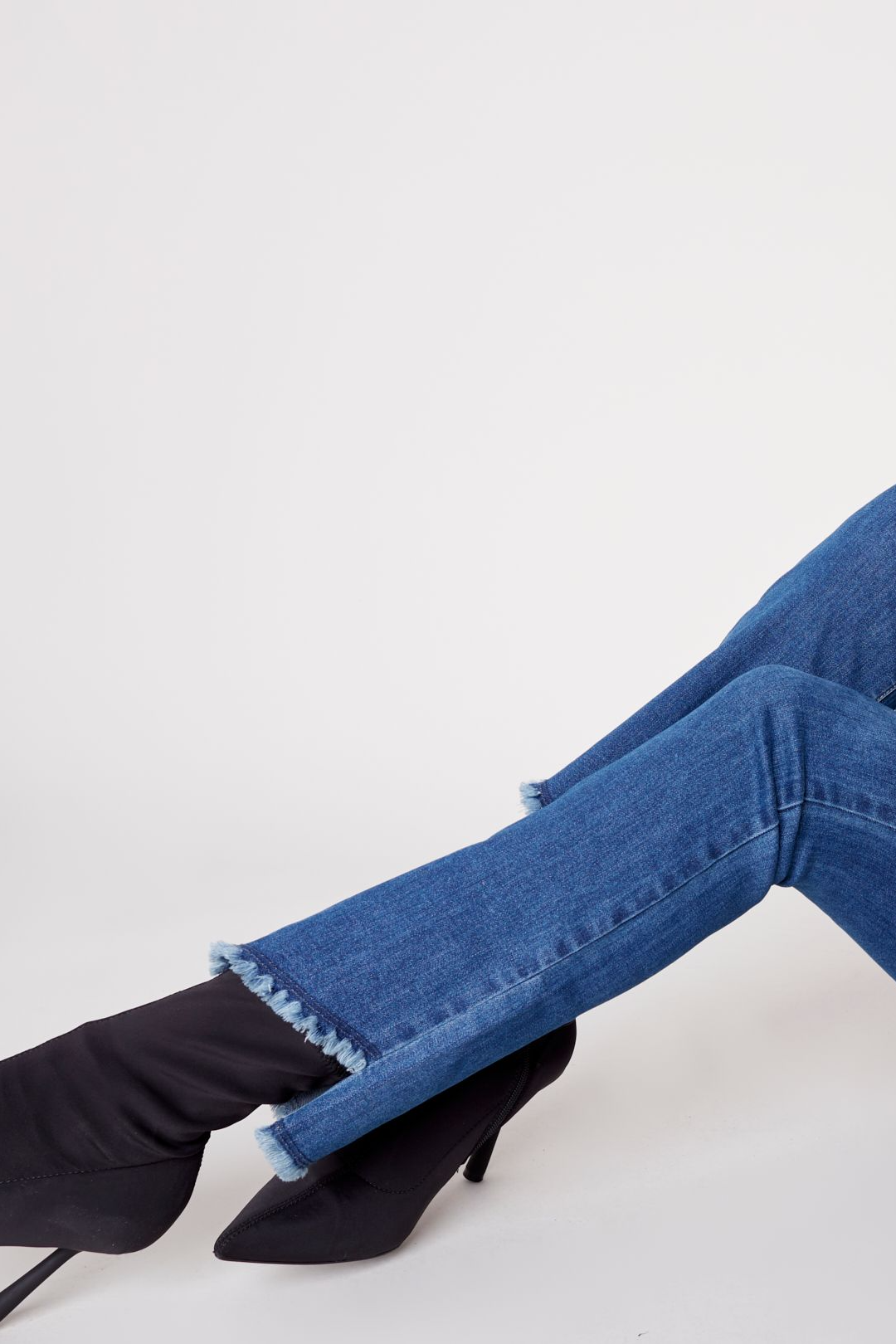 Asymmetrical hem bootcut leg pant