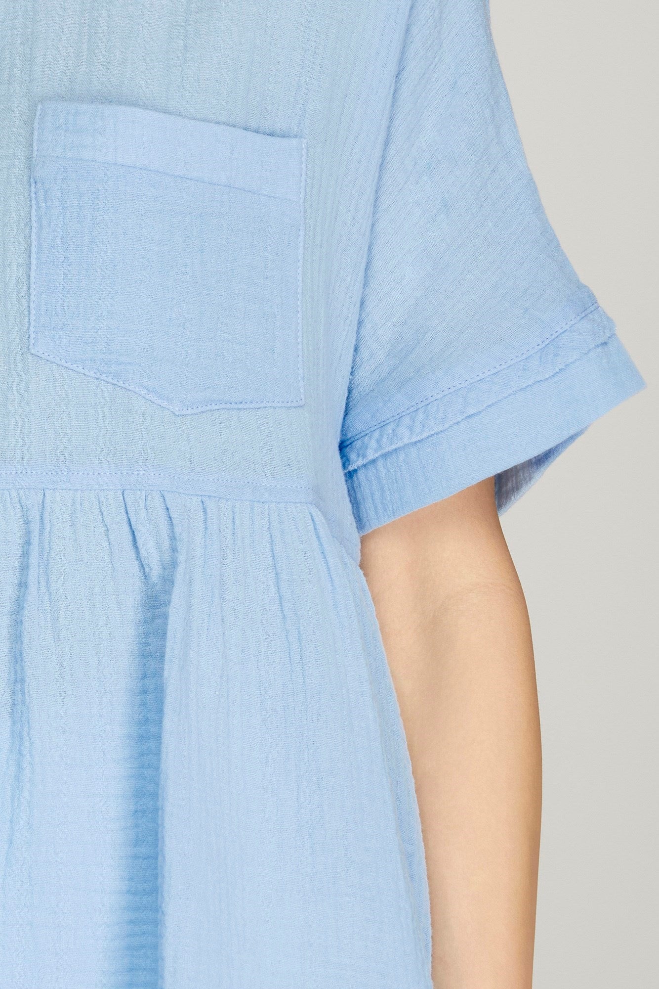 Baby doll top with front pocket