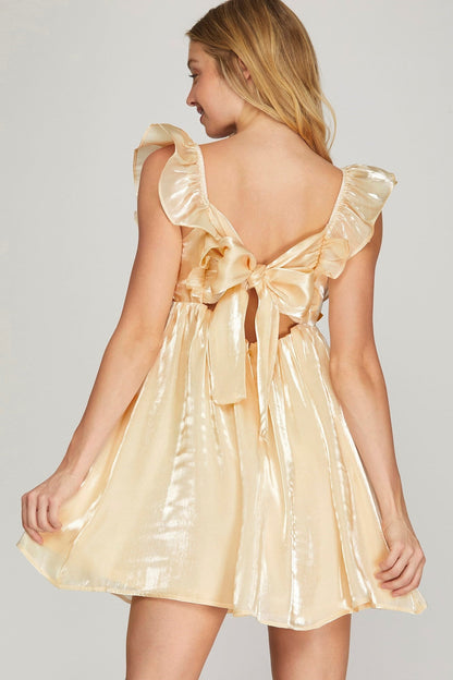 Shiny mini dress with back bow detail