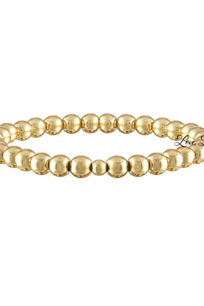 Build Your Own Stack Of Beaded Bracelets Made with Elastic
