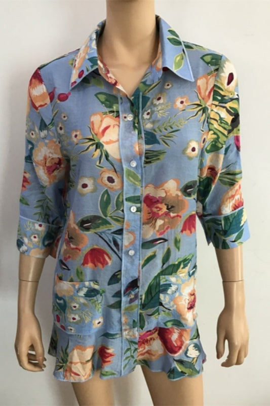 Blue floral button down blouse with bottom ruffle